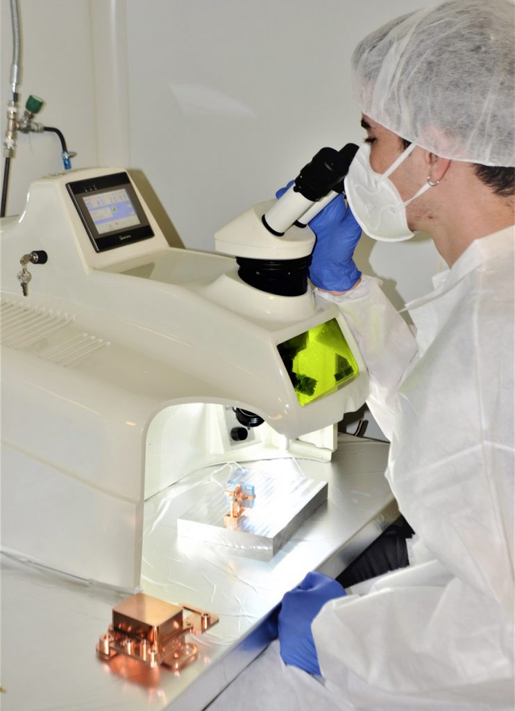 Technician working on head integration of a LTCC sensor