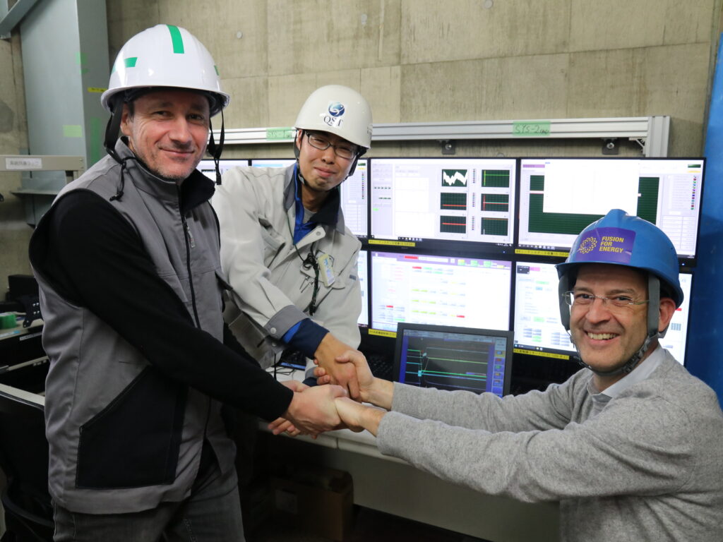Colleagues from JEMA Energy, QST and F4E celebrate the success in front of the control screens. February 2025. ©QST