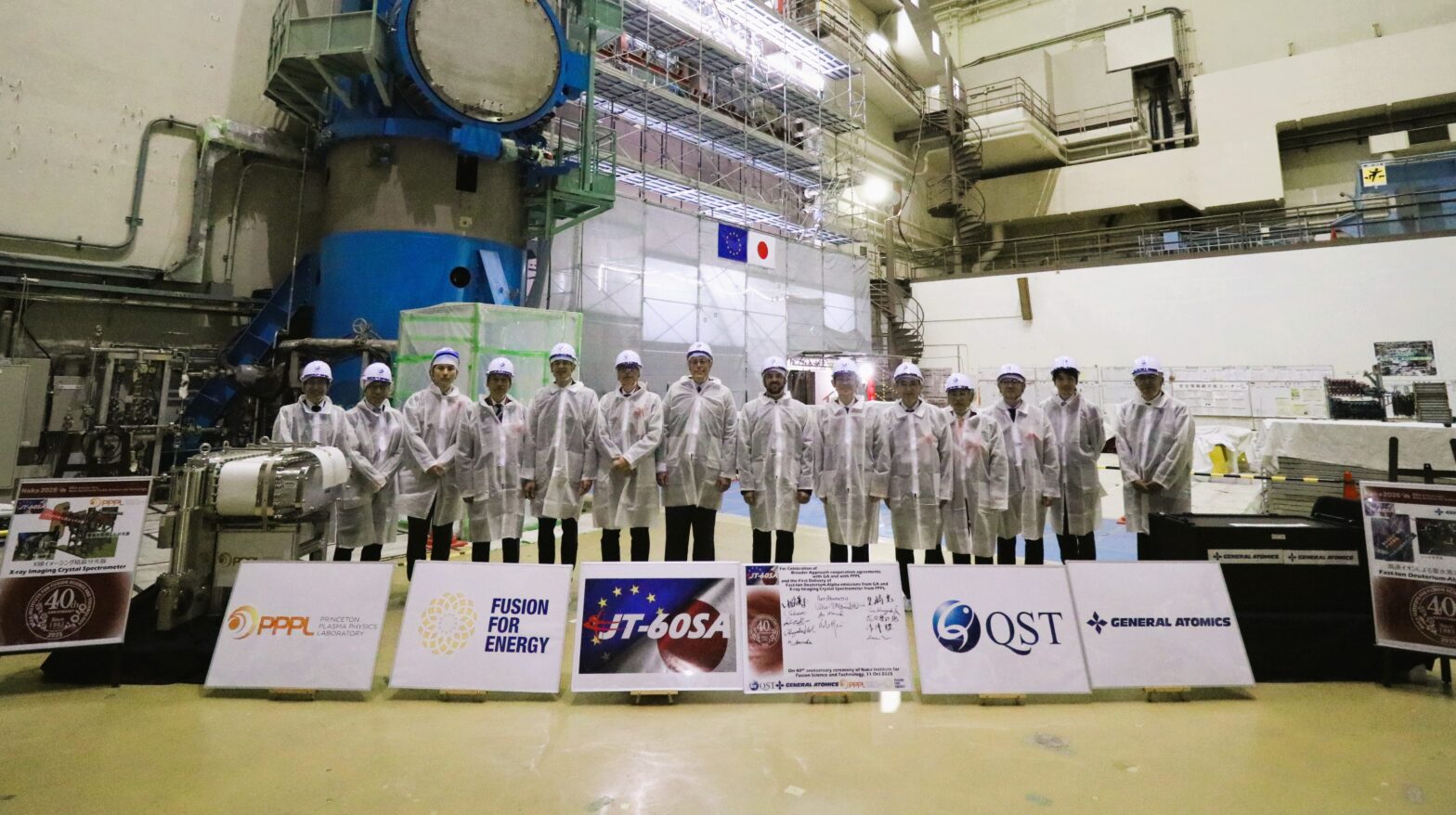 Commemorative group picture with delegates from QST, F4E, PPPL and GA, taken during the 40th anniversary ceremony of the QST Naka institute.