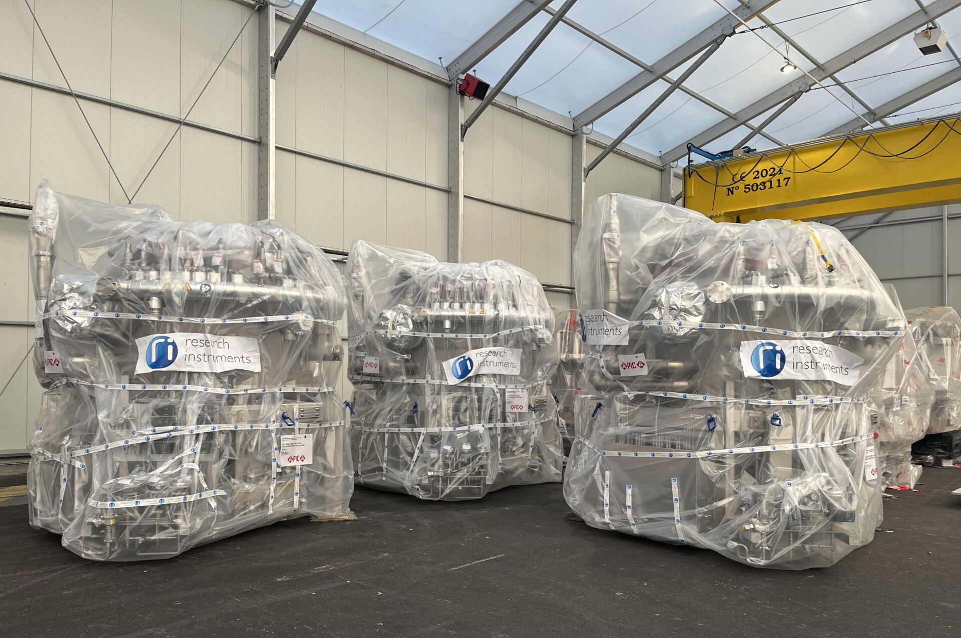 The three Neutral Beam cold valve boxes delivered by F4E. Behind them are the other units for torus and cryostat cryopumps. ©F4E