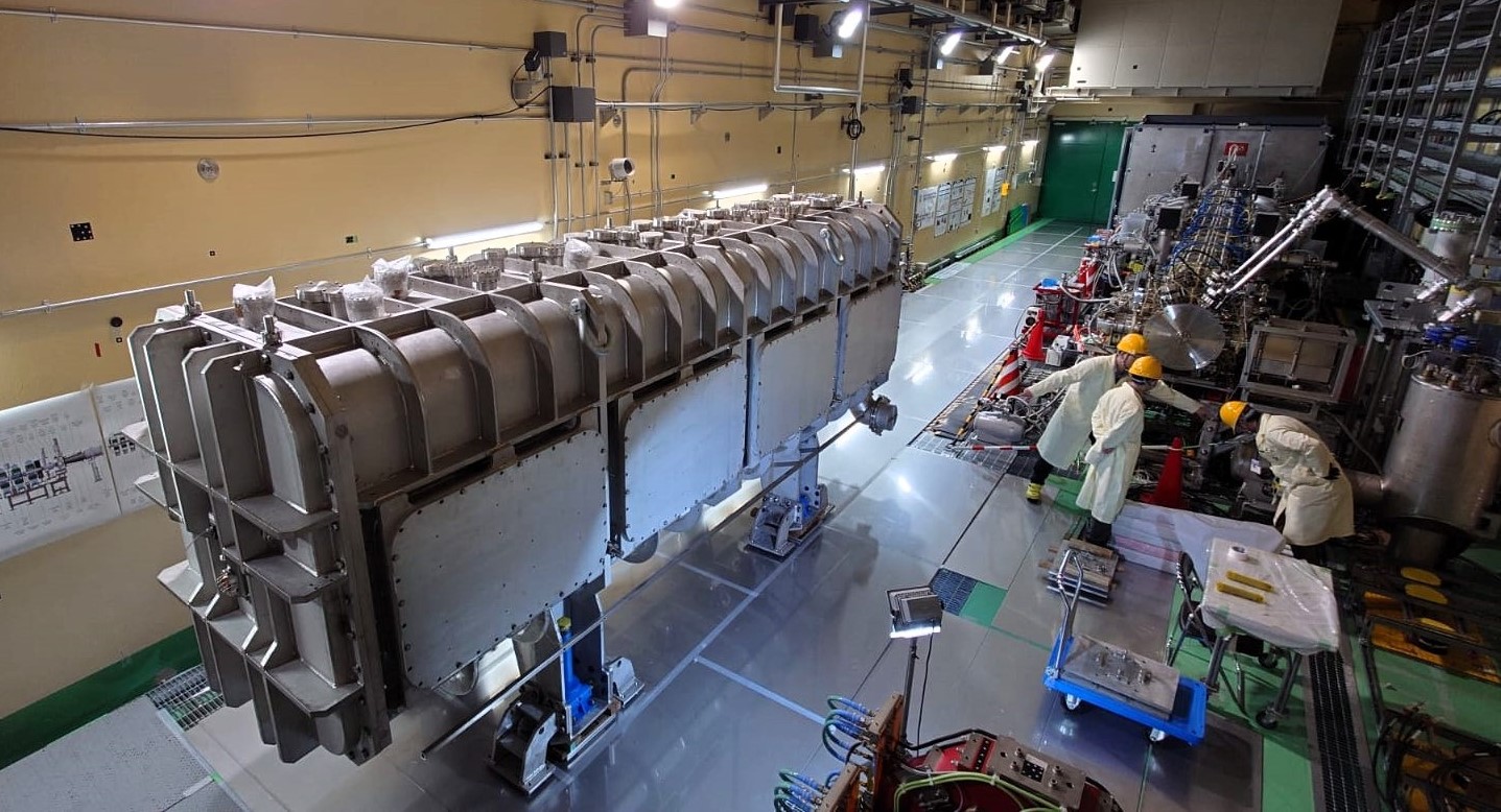 The SRF linac cryomodule inside the accelerator vault, next to the beam line. ©IFMIF/EVEDA