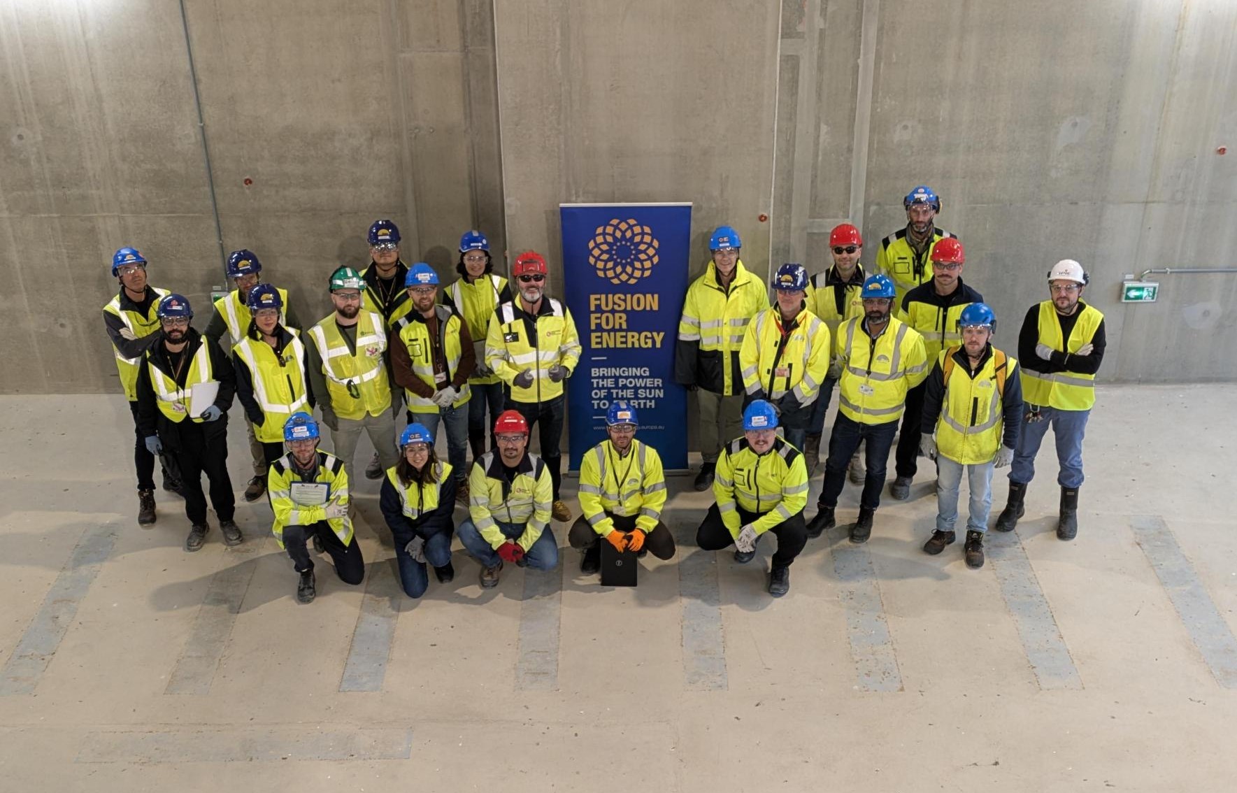 Group picture in the galleries of B37 with representatives of F4E, ITER Organization, Demathieu Bard, APAVE, CEA, b.Next consortium and SP Batiment. November 2025. ©ITER Organization