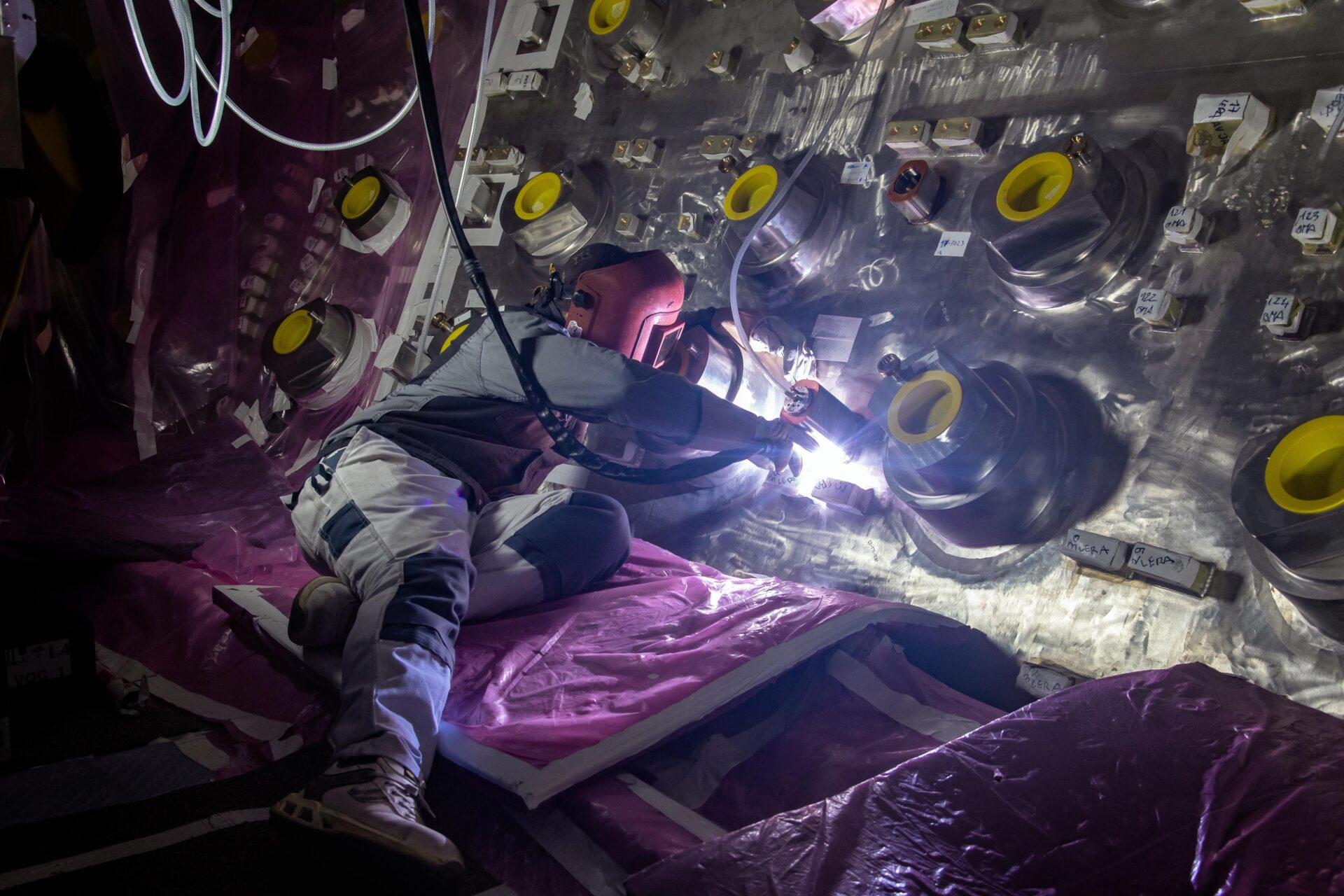 Welding of diagnostic supports onto Korea’s sector 6, resting in the tokamak pit. February 2026. ©ITER Organization