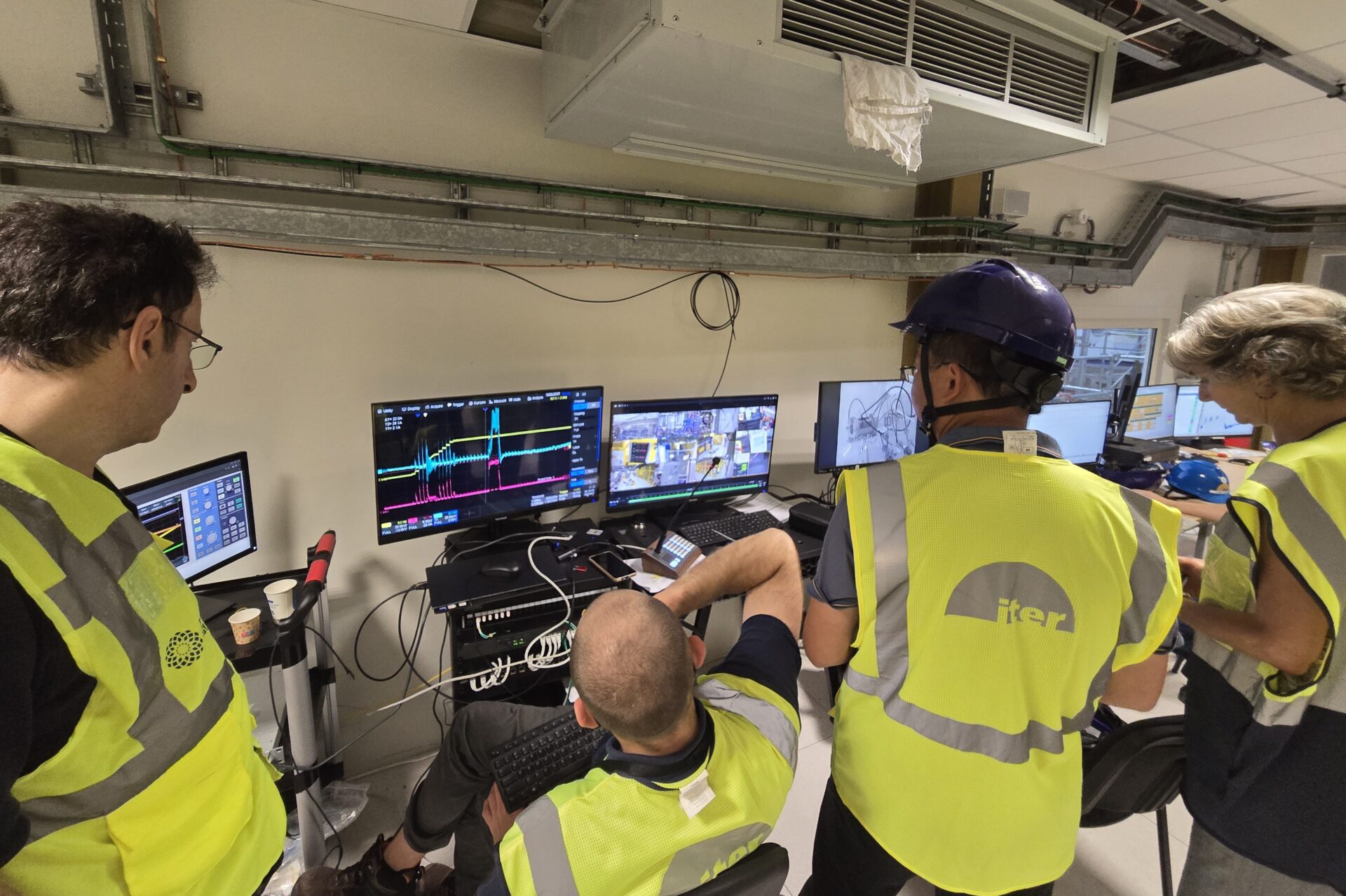 The European teams monitor the performance of the power supplies from the control room. ©F4E